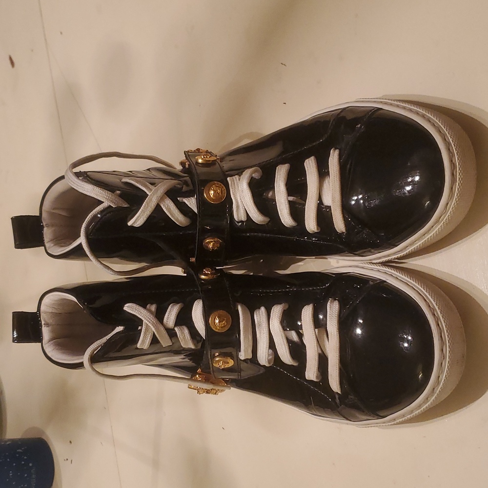 Versace high tops shoes.
